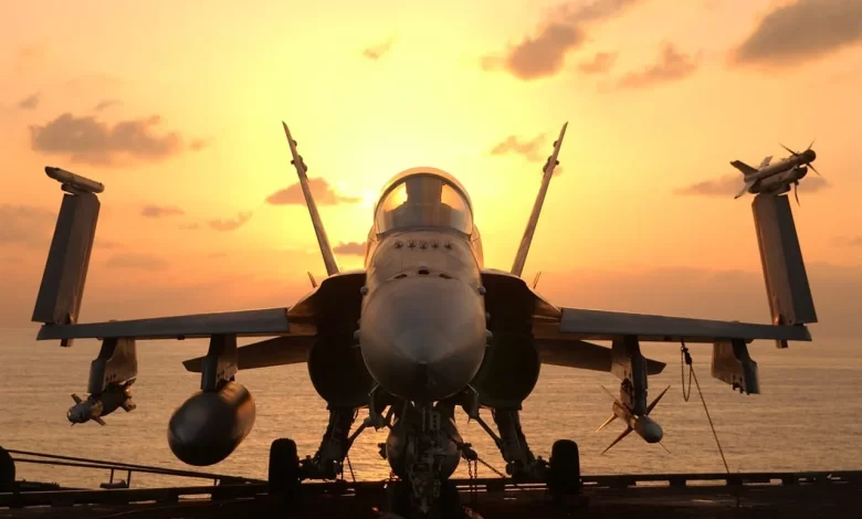 Fighter jet standing on aircraft carrier